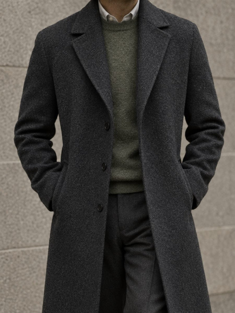 Man wearing a charcoal wool overcoat